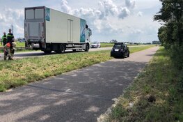 Auto tegen vrachtwagen: N250 afgesloten