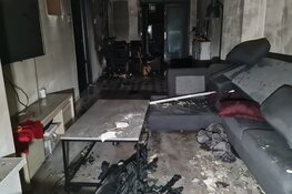 Gezin met ladder uit brandende woning gered