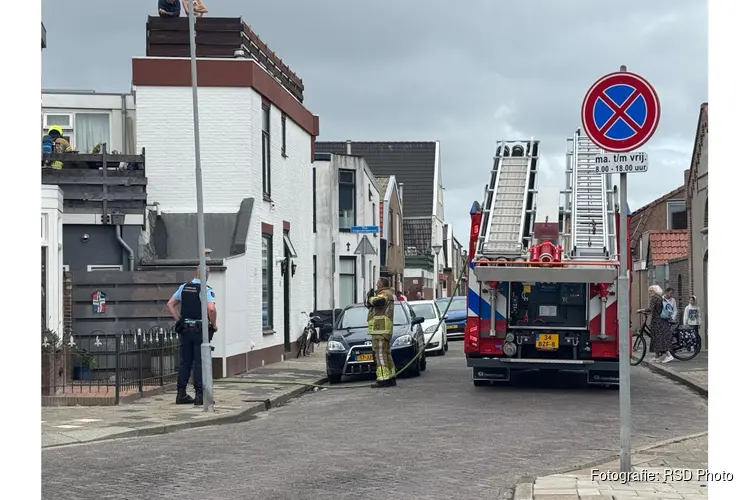 Brand in wasrek bij woning in Den Helder